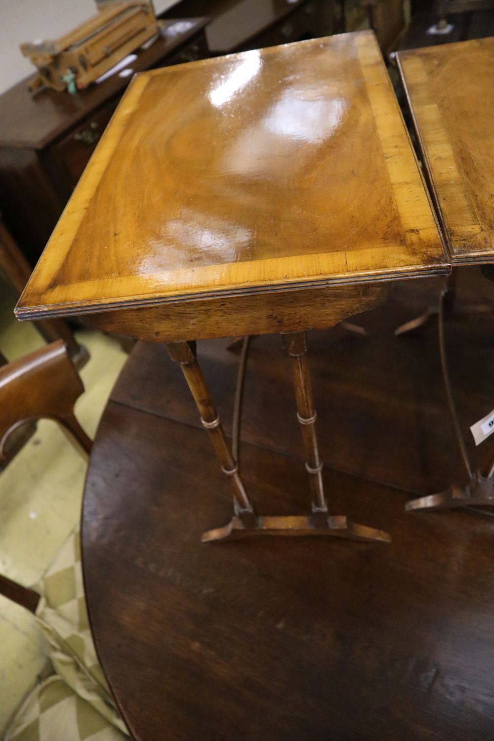 Three rectangular walnut occasional tables (formerly a nest of tables), largest width 50cm, depth 34cm, height 56cm